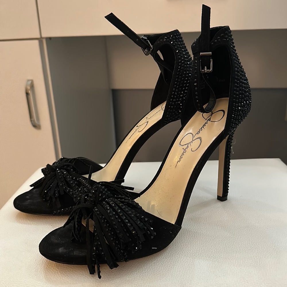 High heals. Black. Size 9M. Have little Pom Pom like design for the toe.